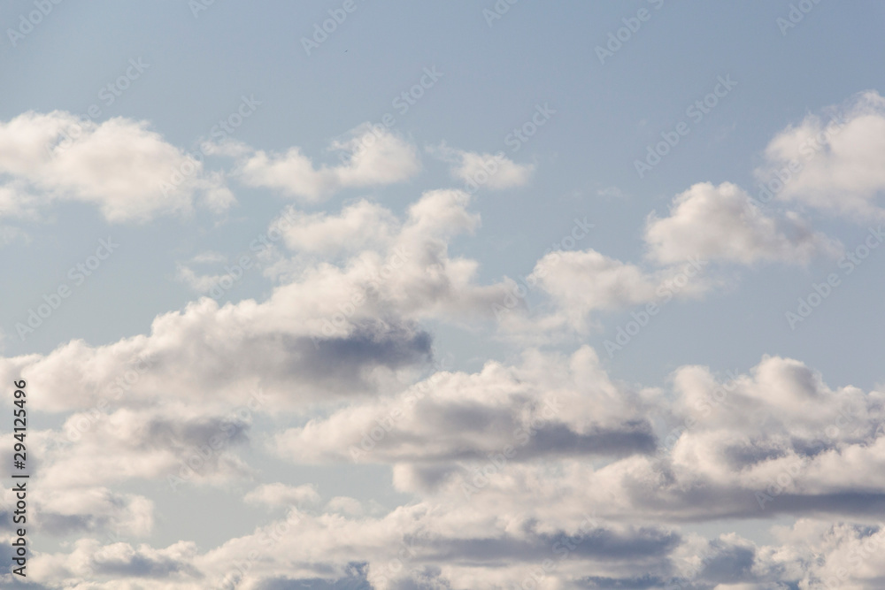 Cloudscape. Blue sky and white cloud. Sunny day. Cumulus cloud