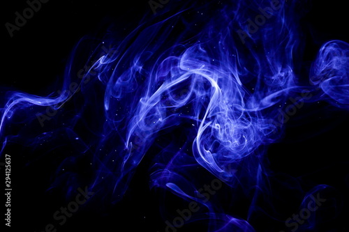 Blue smoke on black background