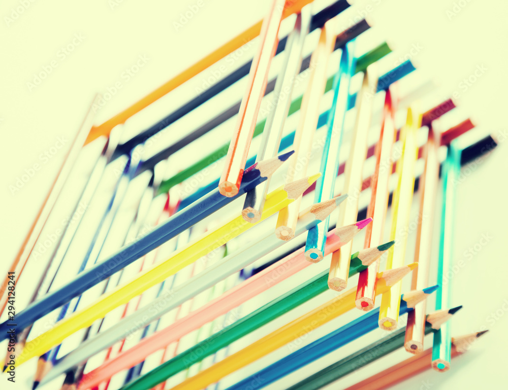 pencils stacked in log house