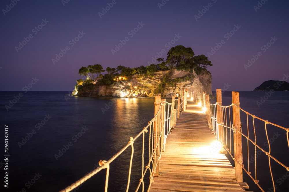Obraz premium Cameo island at night. Hanging bridge to the island at night, Zakhynthos in Greece.