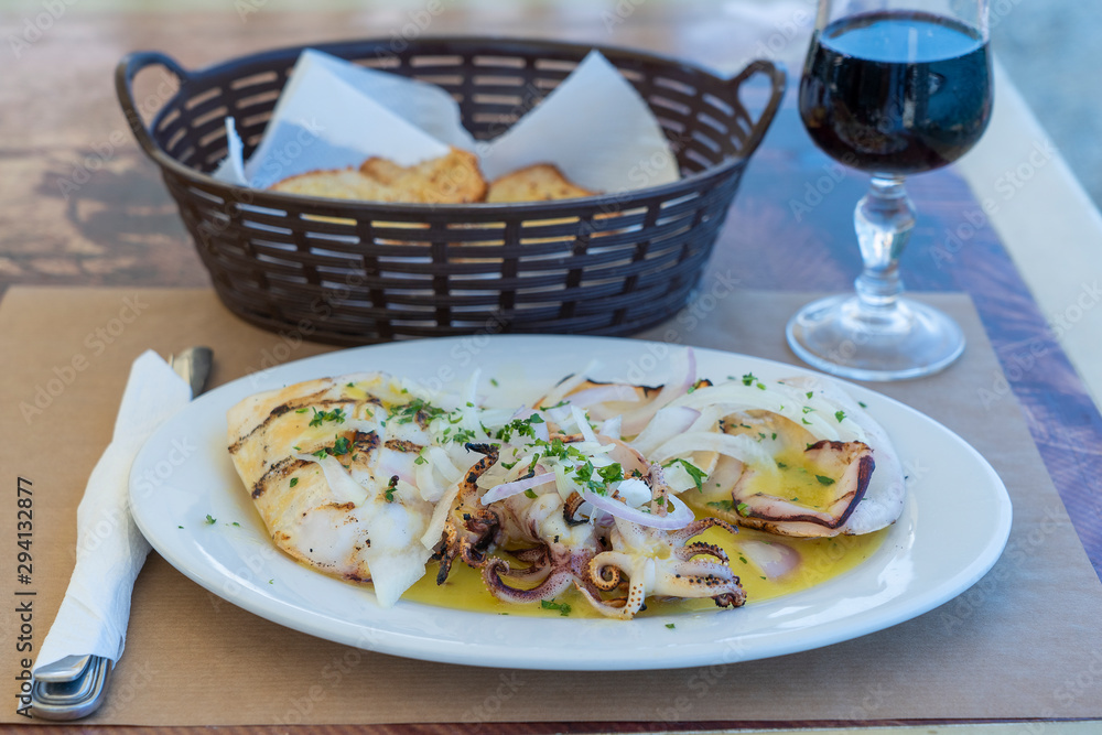 European cuisine, Mediterranean dish. Grilled squid with oyster sauce, Greece