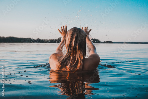 Canvas Print Finnish Girl in a Lake swimming, blue, Finland, summer