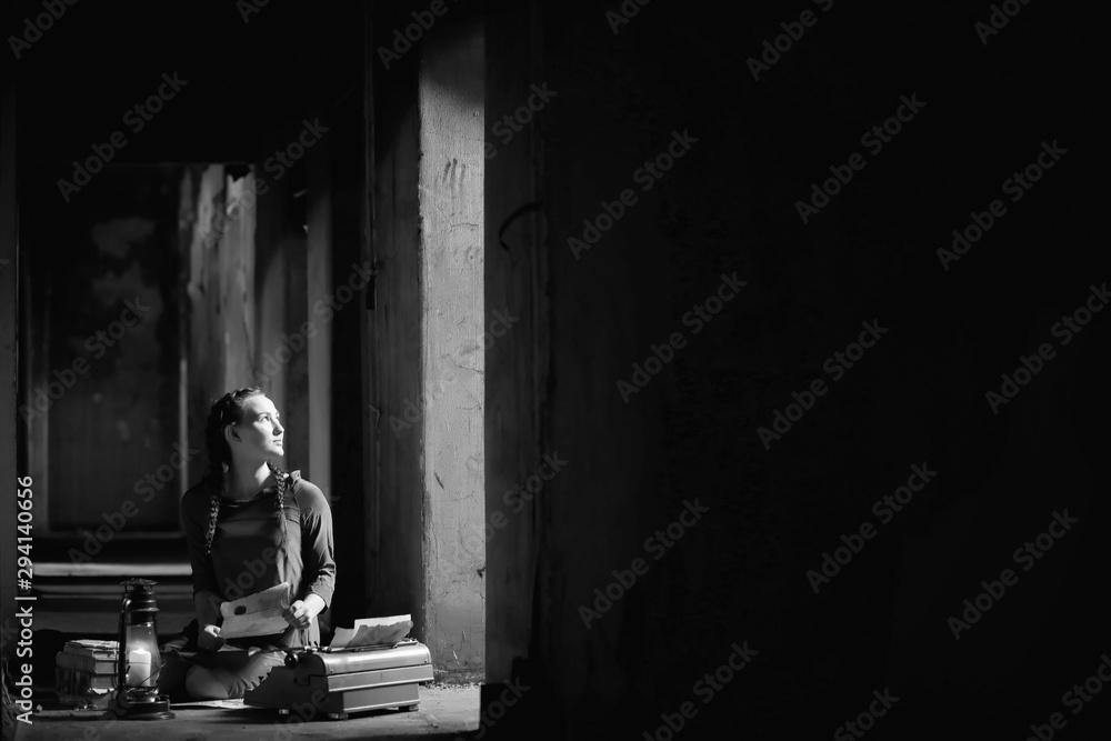 Retro girl in the old house reading books