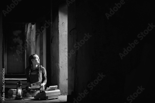 Retro girl in the old house reading books