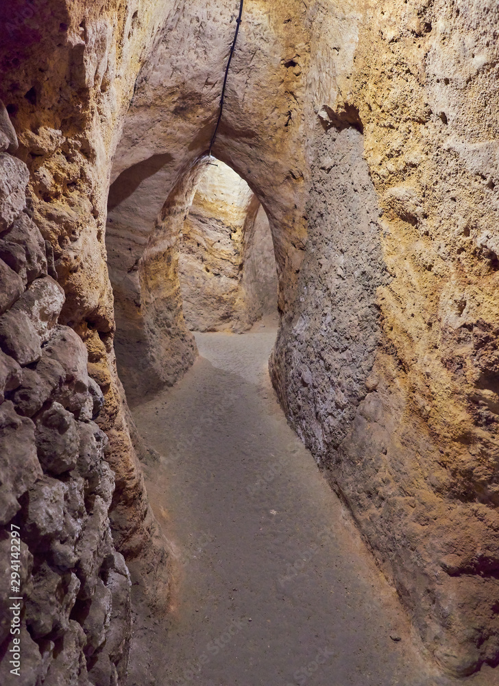 Vertical selective focus view of the galleries of the arab caves labyrinth built under the medieval city of Brihuega, Guadalajara, Alcarria, Castilla la Mancha, Spain