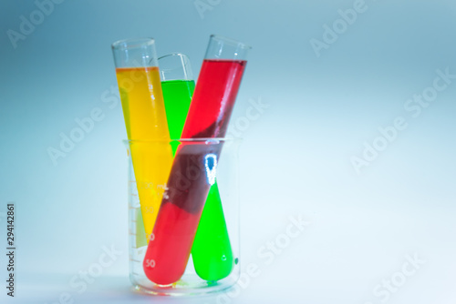 Science chemical tubes with colorful liquid. Medical laboratory research background. pharmacology and biotechnology concept. Copy space for texting. photo