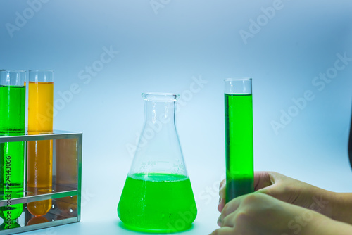 Science chemical tubes with colorful liquid. Medical laboratory research background. pharmacology and biotechnology concept. Copy space for texting. photo