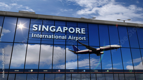 Canvas Print Airplane landing at Singapore mirrored in terminal