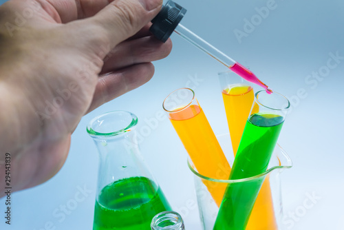 Science chemical tubes with colorful liquid. Medical laboratory research background. pharmacology and biotechnology concept. Copy space for texting. photo