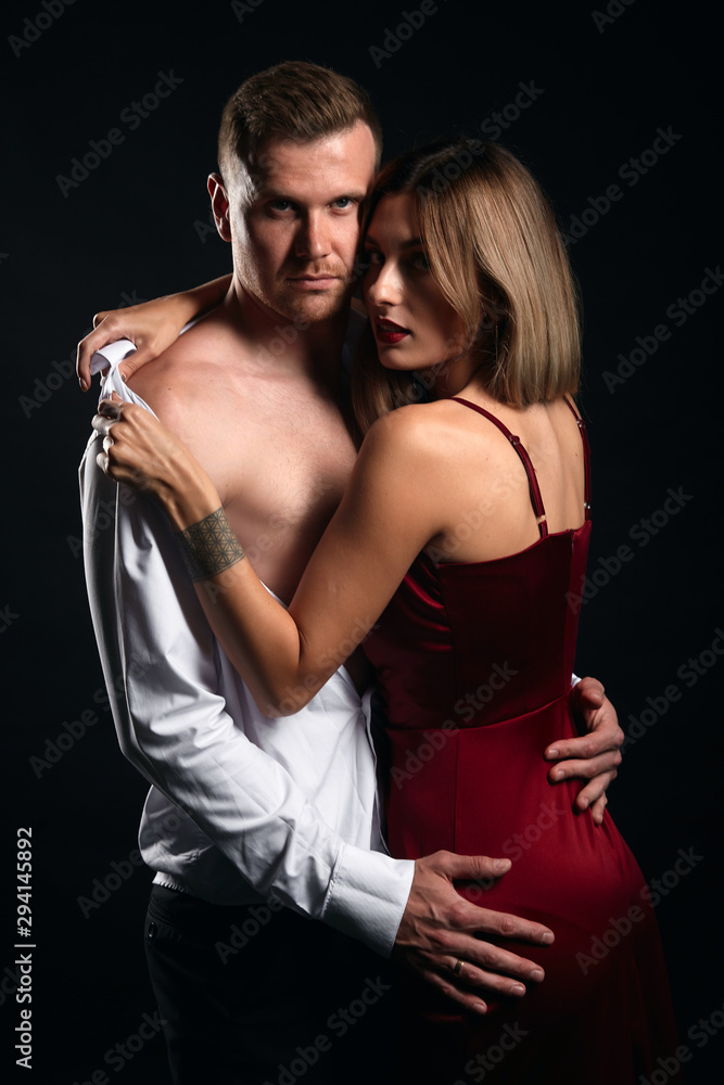 loving romantic man and woman in tenderness. close up portrait, young couple celebratinf St. Valentine's day loving romantic man and woman in tenderness. close up portrait, young couple celebratinf St. Valentine's day
