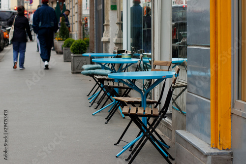 Canvas Print chairs and tables outside a cafe