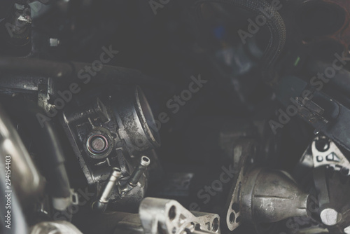 Disassembled car dirty engine cylinder at garage