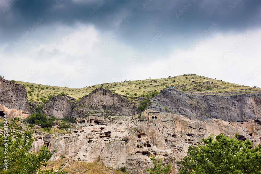 ancient cave city Vardzia in the mountains of Georgia in the Caucasus