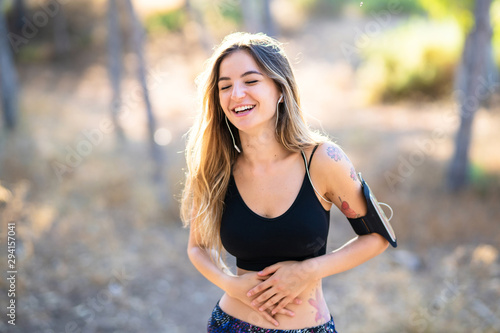 Young sport girl at outdoors smiling a lot