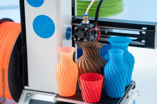 Wallpaper Mural 3D Printer Plastic filament for 3D printer and printed products in the interior of the design office Torontodigital.ca