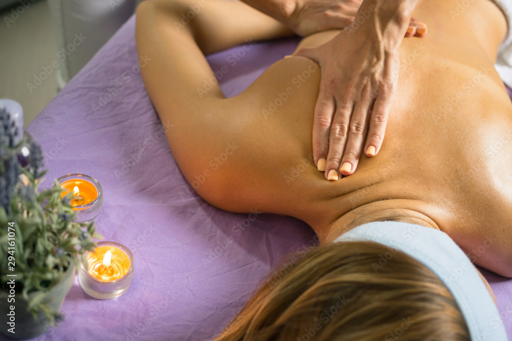 Fototapeta premium Female relaxing back massage with hands. Beauty body skin care treatment concept.