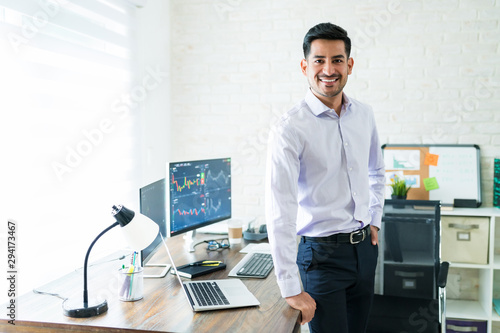 Attractive Male Finance Professional Working At Home photo