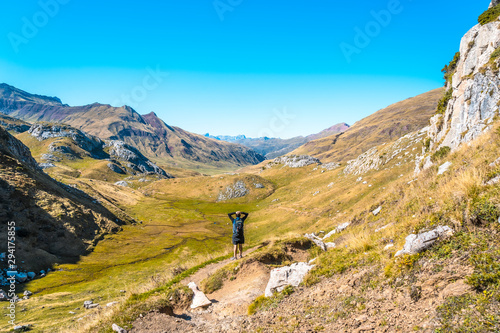 Valle de Hecho, Huesca / Spain »; September 28, 2019: A young man watching the valley of Hecho from the descent of the Ibon