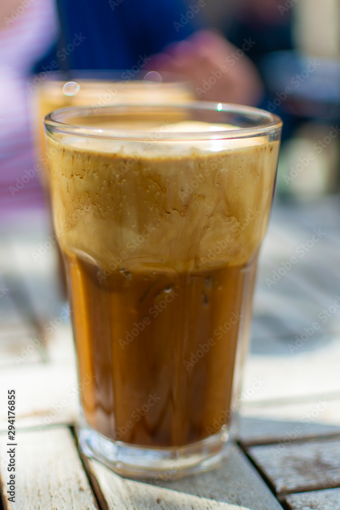 Traditional greek cold coffee Frappe made from water, instant coffee and ice cubes Traditional greek cold coffee Frappe made from water, instant coffee and ice cubes