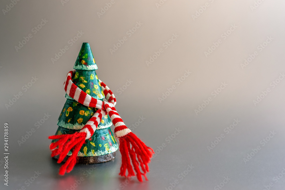 Minimalistic Christmas tree made of evergreen fir plant on red background. Christmas, new year concept. Flat lay,