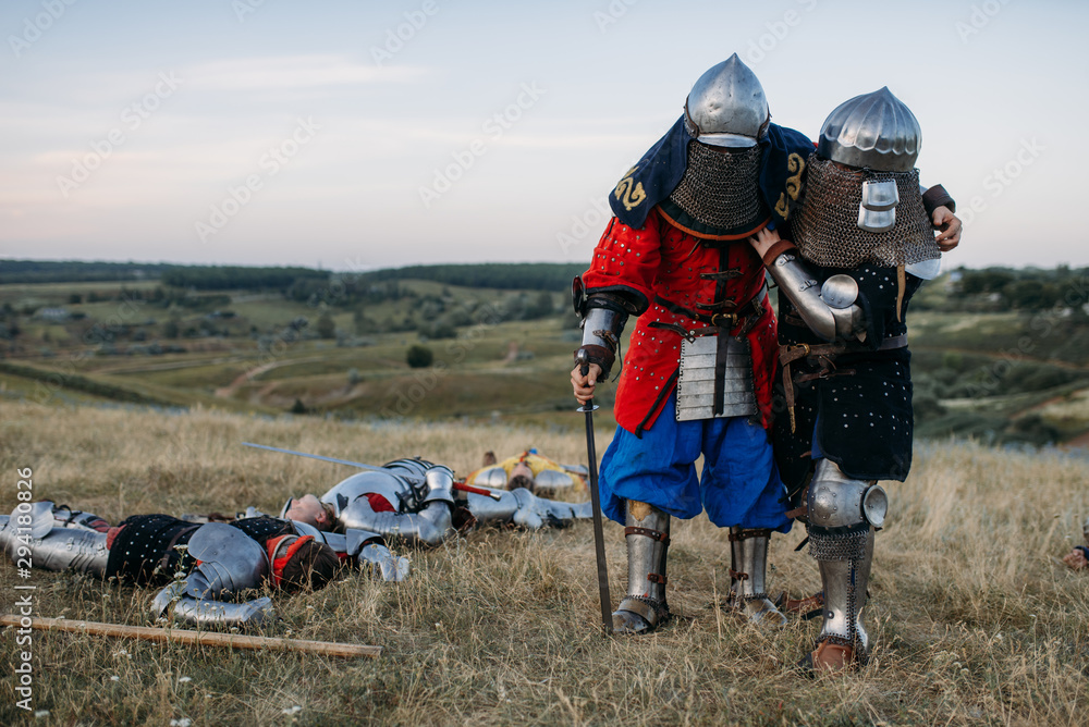 Wounded medieval knights after great battle Wounded medieval knights after great battle