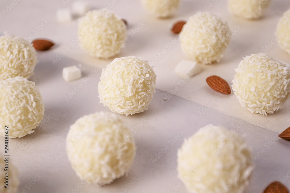 Round sweets with coconut. Raw handmade candy, healthy dessert. Round sweets with coconut. Raw handmade candy, healthy dessert.