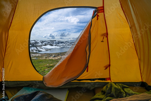 Hiking winter travel concept. View from tent - beautiful landscape of mountain nature