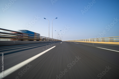 high speed view of asphalt road photo