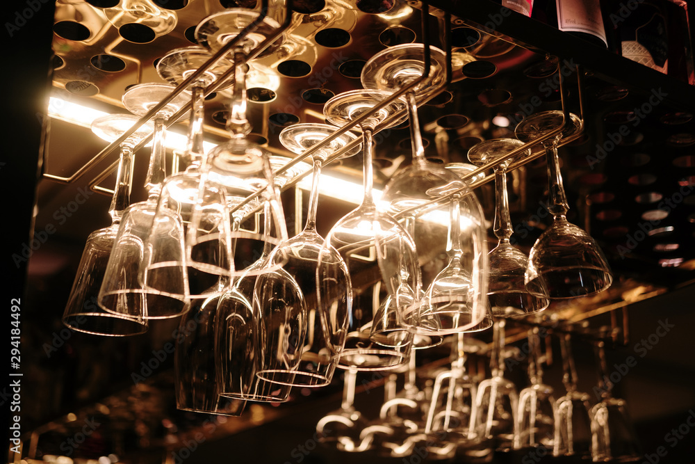 Drinking glasses hanging on the rack