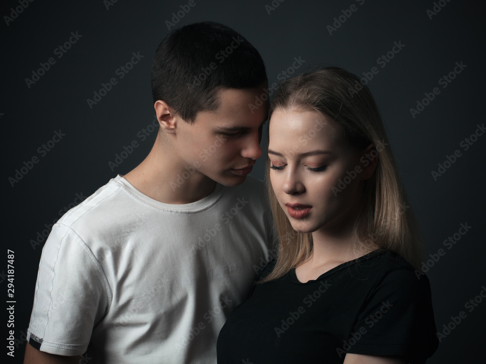 Portrait of young couple in studio