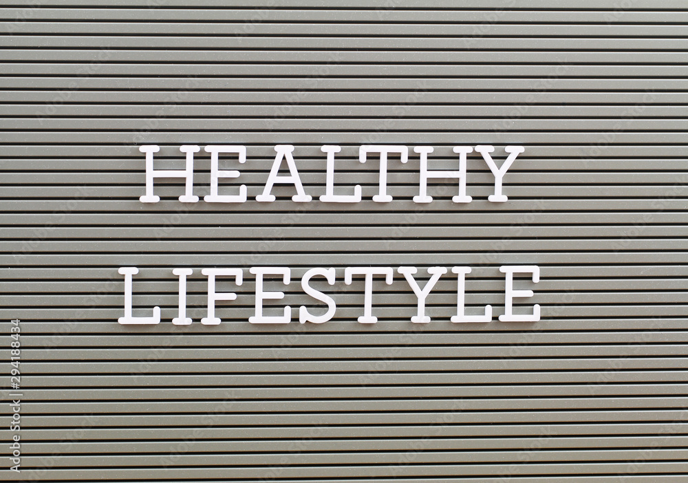 Healthy lifestyle written with plastic letters on grey board