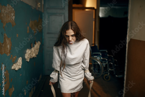 Photo Female patient in a fit of rage, mental hospital