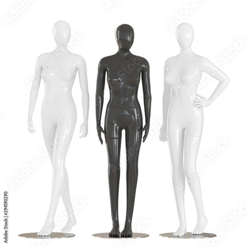 Fotografie Two white female mannequin and one black between them on an isolated background