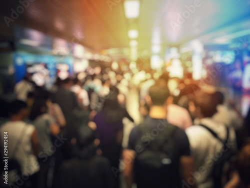 Wallpaper Mural blurred image of Crowded station with people and passenger standing, walking and waiting for pick and choose the best public transport during rush hour in Bangkok city. Torontodigital.ca