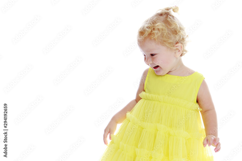 Little girl is showing a finger.The concept of advertising goods Little girl is showing a finger.The concept of advertising goods