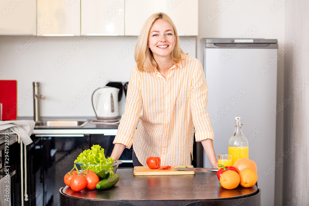 Young woman cooking in the kitchen Young woman cooking in the kitchen