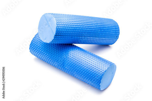 Foam rolls for sports on a white background photo