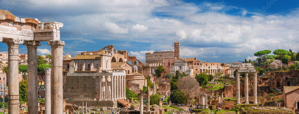 View of the Roman Forum ancient monuments and Coliseum from Capitoline Hill in Rome