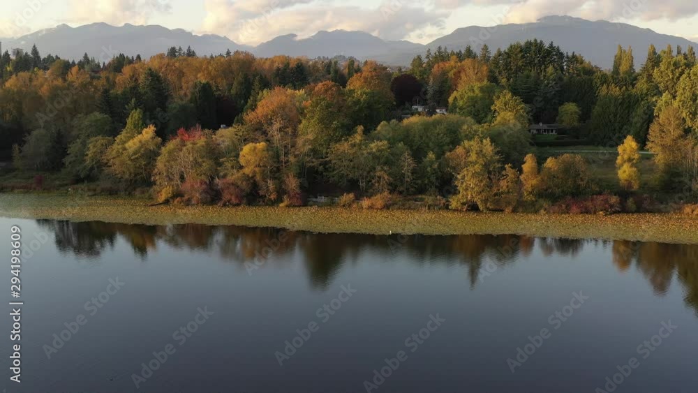 Aerial View at Mountain Lake with Dramatic Clouds in British Columbia, Canada. 4K. Aerial View at Mountain Lake with Dramatic Clouds in British Columbia, Canada. 4K.