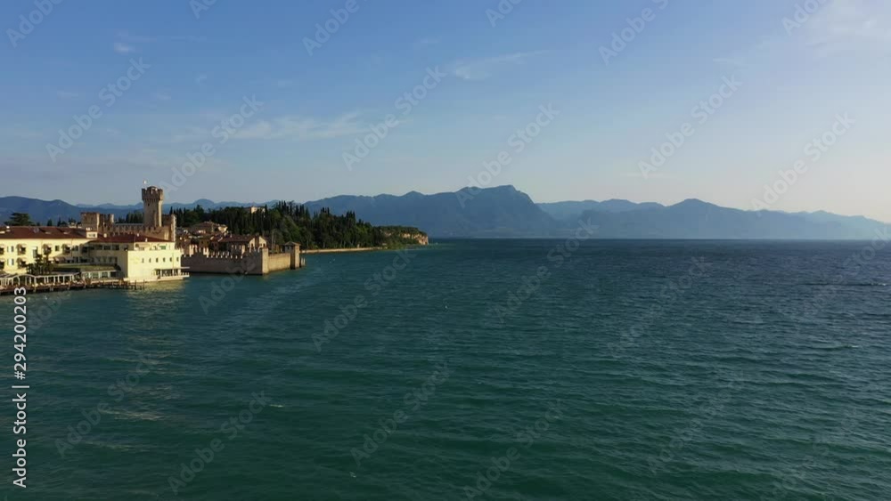 Aerial view of the city of Sirmione. Lake Garda Italy. The film was shot with drone Aerial view of the city of Sirmione. Lake Garda Italy. The film was shot with drone