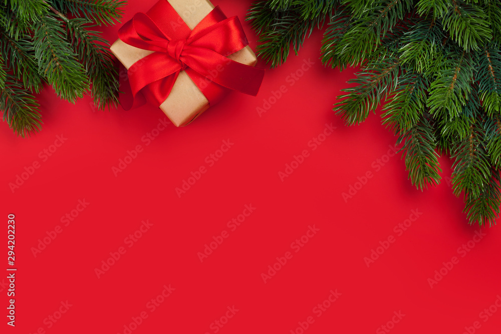 Christmas card with gift box and fir tree branch Christmas card with gift box and fir tree branch