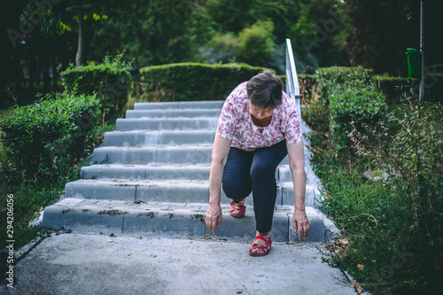 Bilde på lerret Woman slipping on stairs