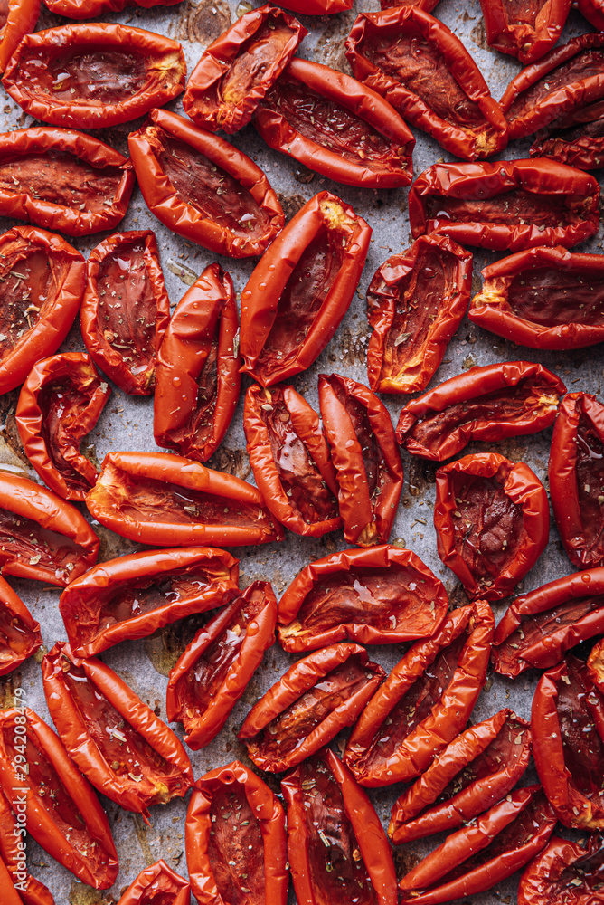 traditional italian food, sun-dried tomatoes made at home. traditional italian food, sun-dried tomatoes made at home.
