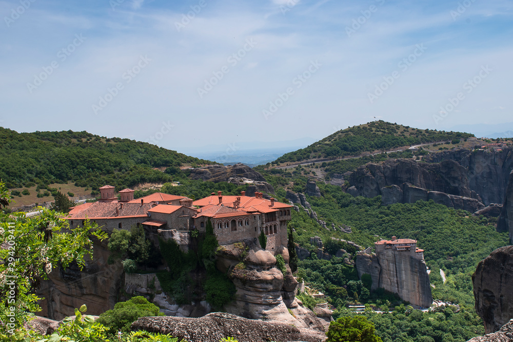Beautiful view of the Varlaam Monastery, located on the edge of a high cliff. Monasterries and Rock formations in Meteora. UNESCO heritage list object. Amazing Greece landscape.