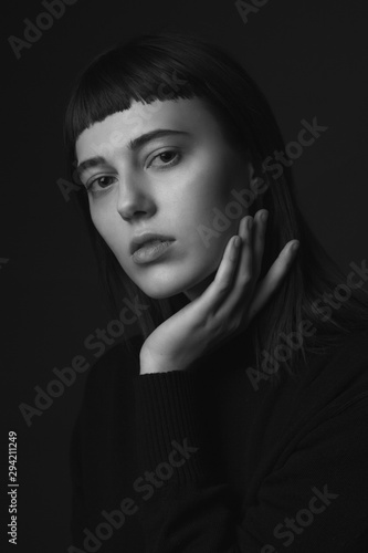 Close up portrait of young woman. Black and white.