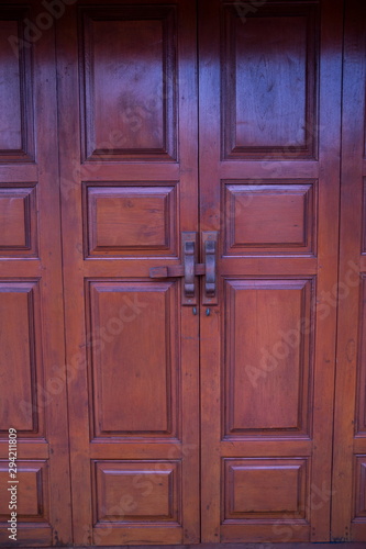 Fototapeta Naklejka Na Ścianę i Meble -  Thai ancient wooden door,Made of teak wood.