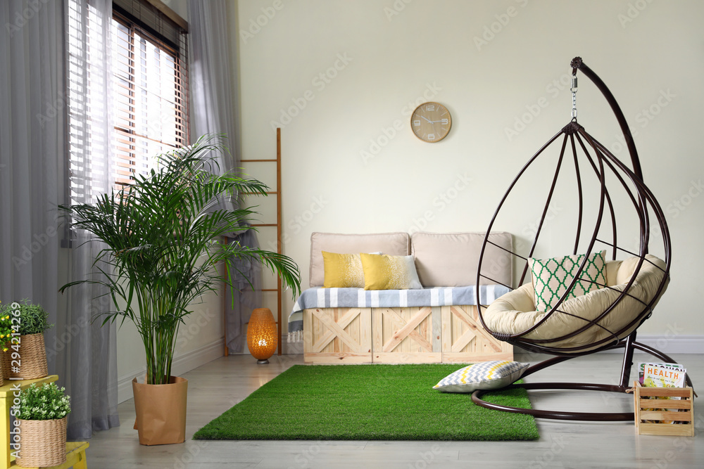 Stylish modern room interior with swing chair Stock Photo | Adobe Stock