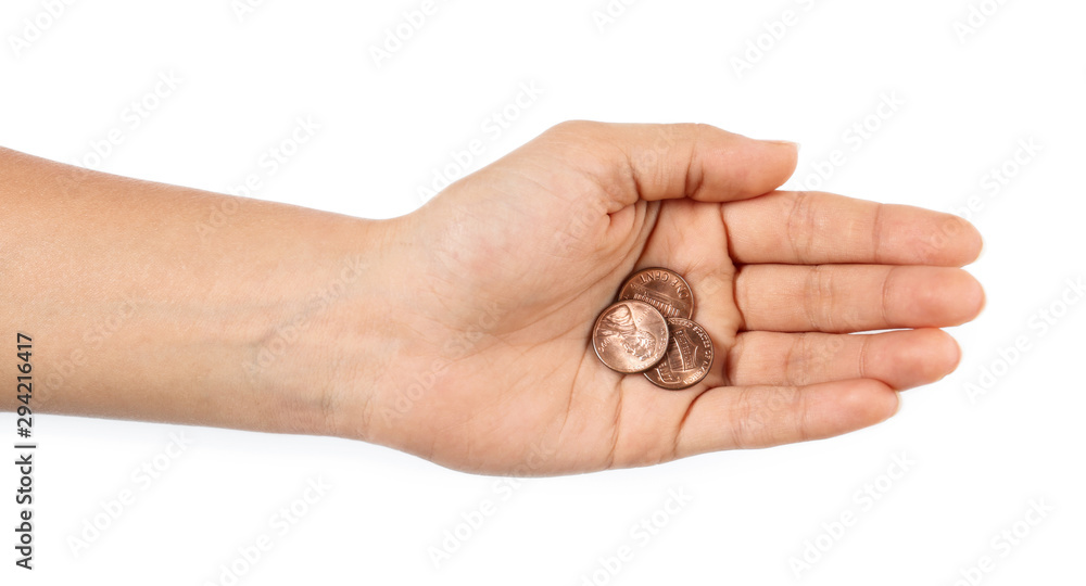 Young woman holding coins on white background, top view Young woman holding coins on white background, top view