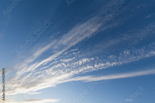 Lines of clouds and blue sky