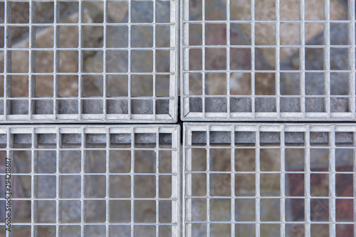 outdoor fence made of metal grating to protect the object